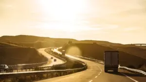 A open freeway with winding turns in the distance.