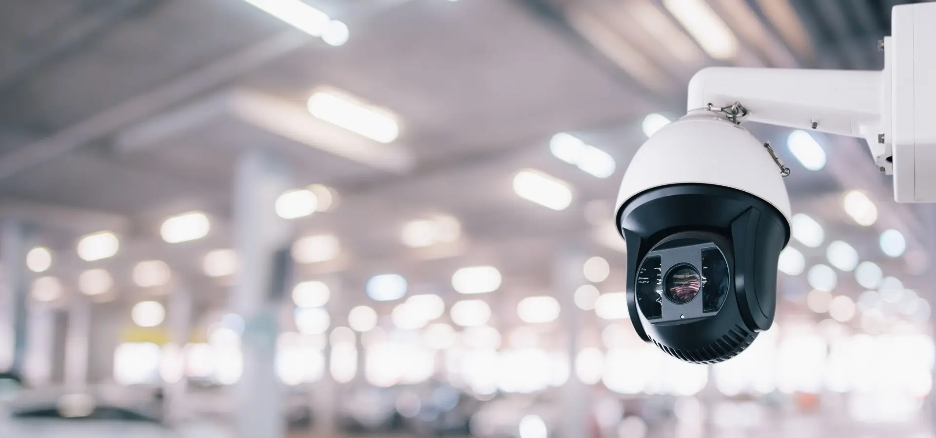 A security camera in a parking structure.