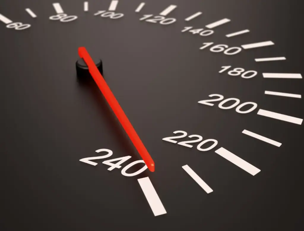 A speedometer where the needle is at the max speed.