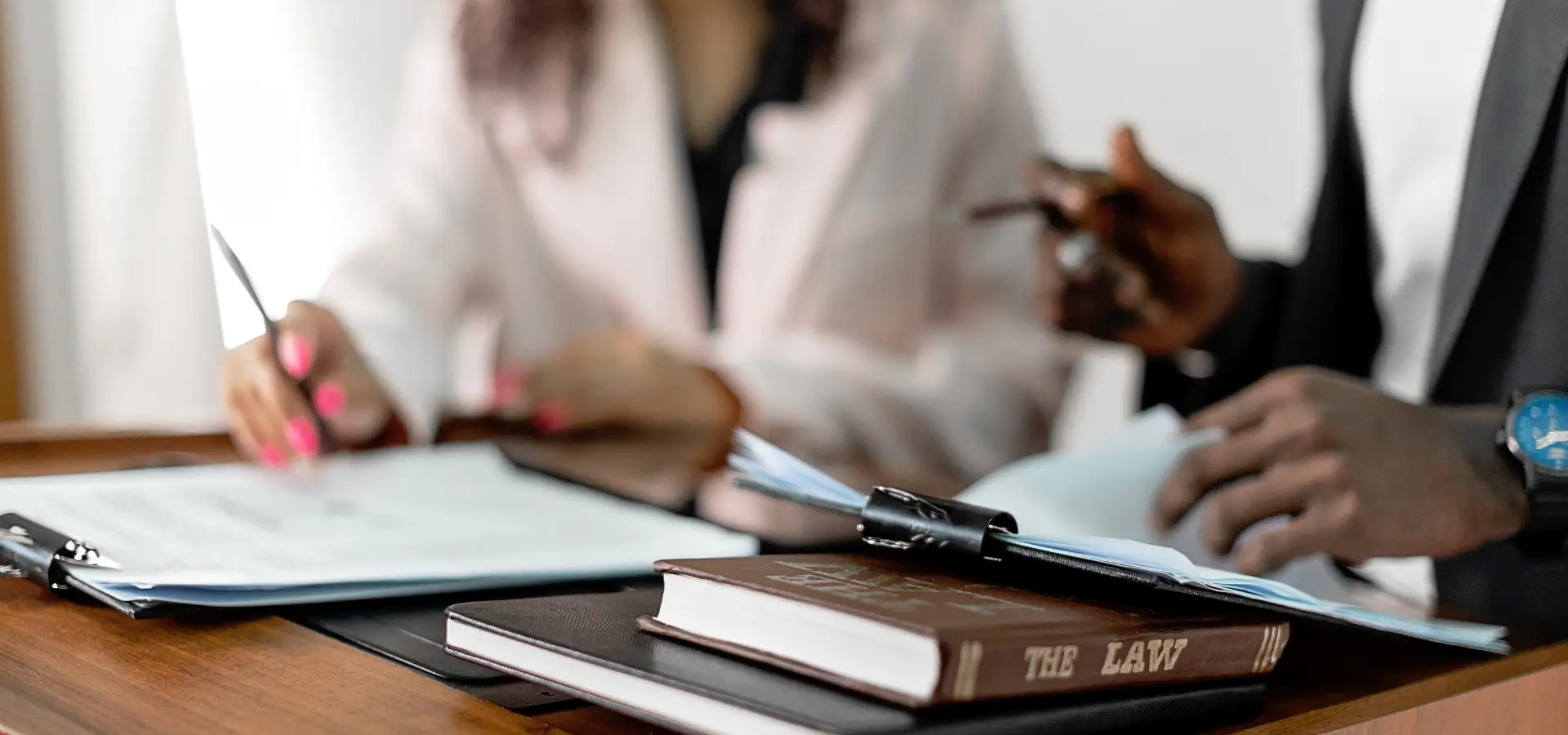 Two people working on a legal case.