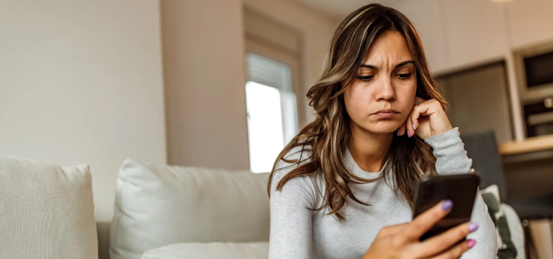 A woman looking at her, wondering if it is worth suing someone with no money at all.