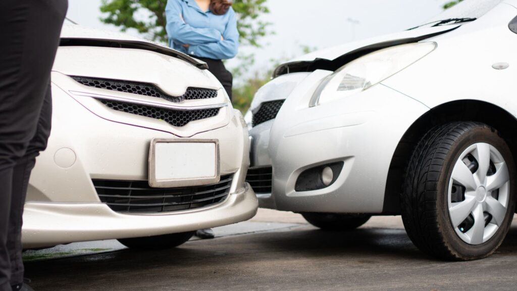 Car accident between two white cars in San Diego.