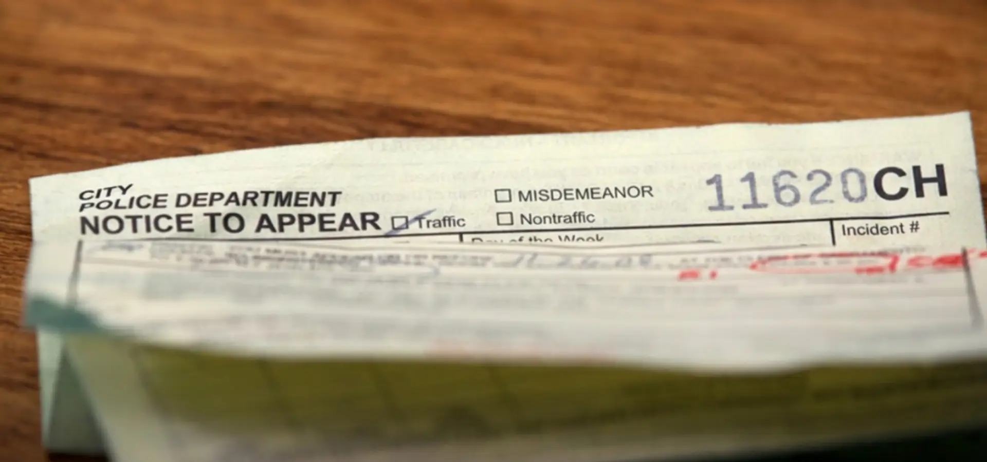 A folded ticket on a table.