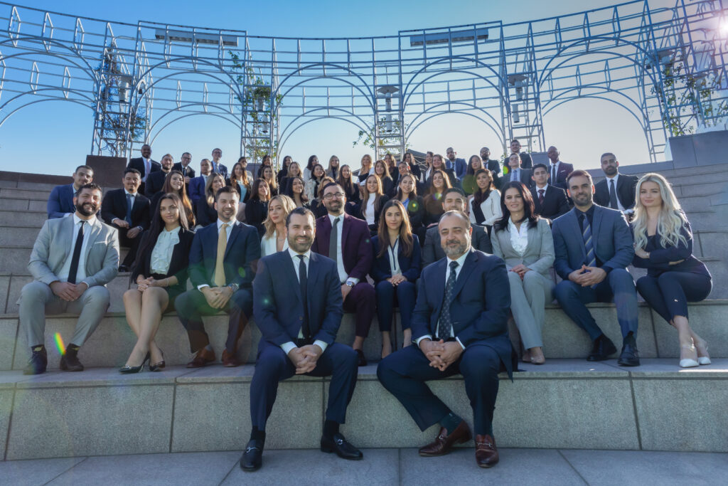 West Coast Trial Lawyers attorneys and staff group picture.