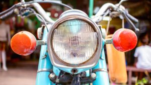 A light blue motorcycle headlight