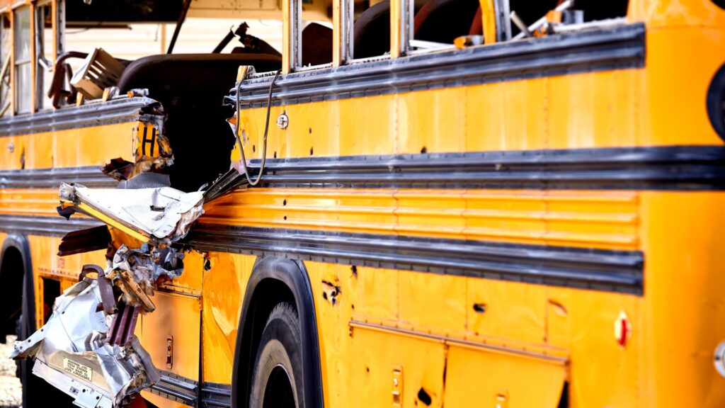 School Bus crash with a large hole on the side