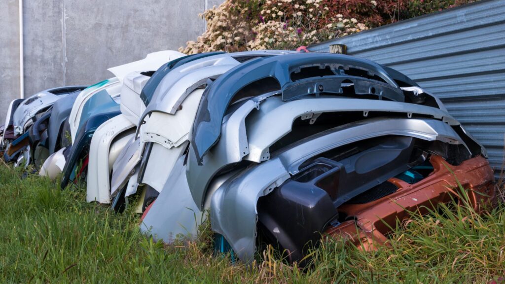A row of car bumpers stacked on top of each other.