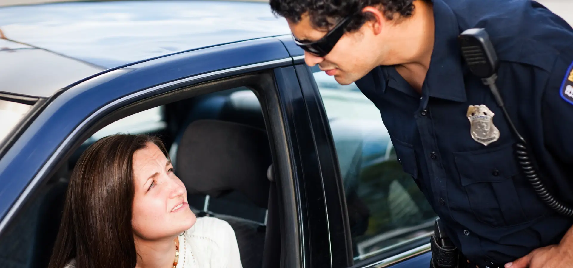 An officer confronting a driver about her honking.