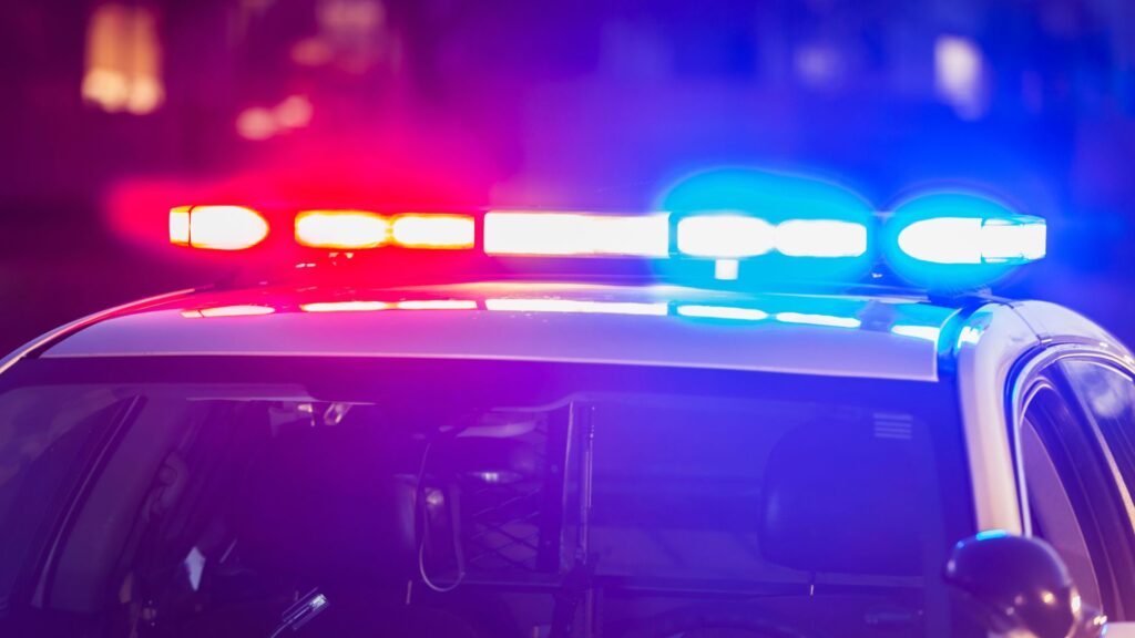 A police car that turned on their lights.