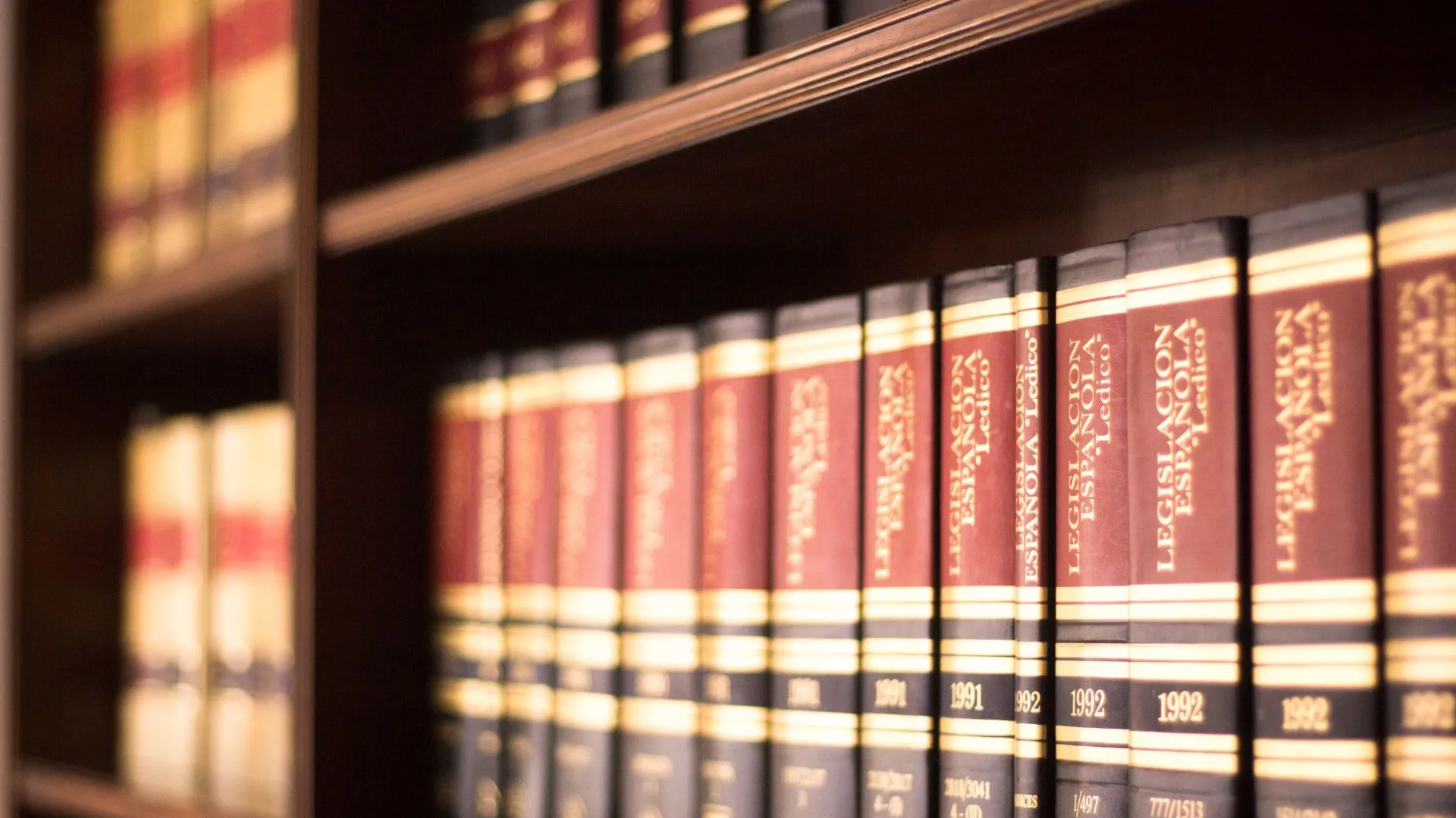 A book shelf filled with books about the law.