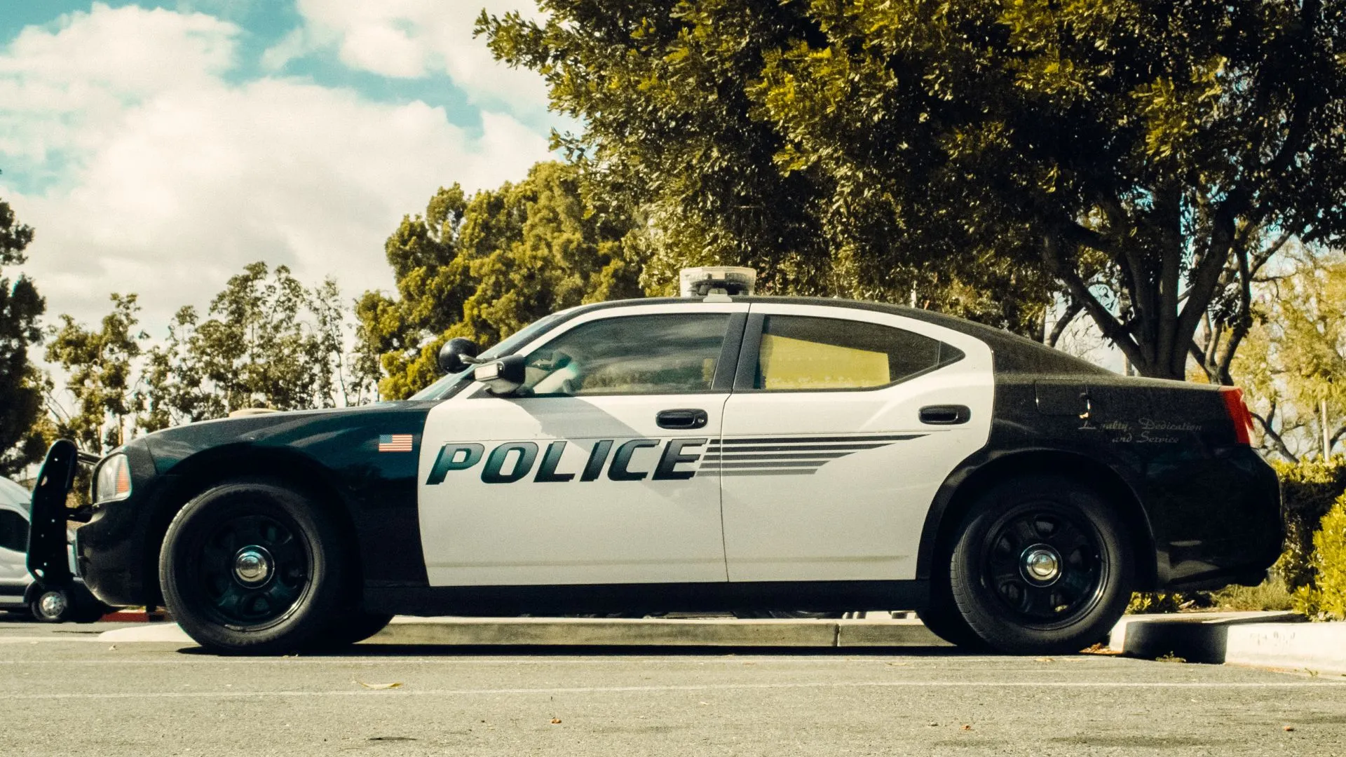 A new police car on the road.