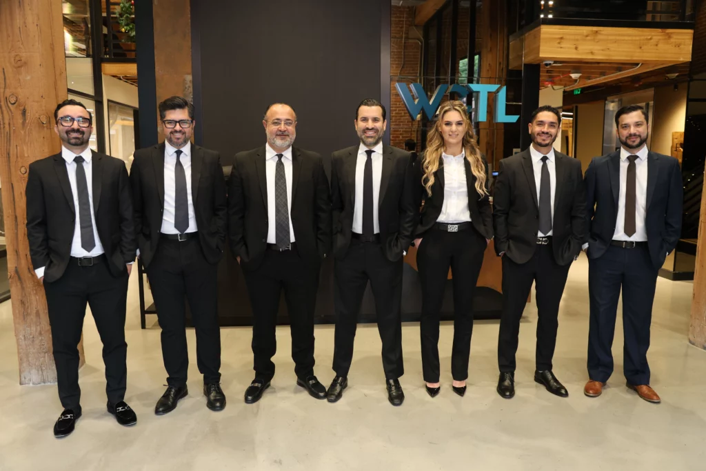 A row of attorneys from West Coast Trial Lawyers.