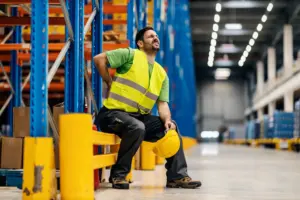 A man with an injured back at work.