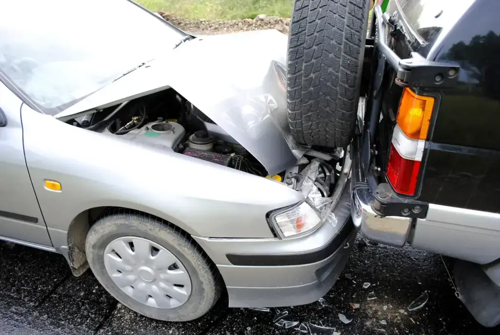 A Jeep that was rear-ended by a sedan.