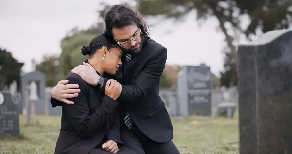 A sad couple grieving for an unfortunate passing.