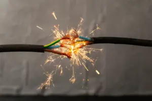 A faulty electrical wire.