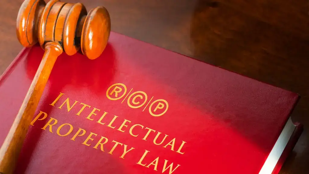 A red book titled 'Intellectual Property Law" with a gavel on top.