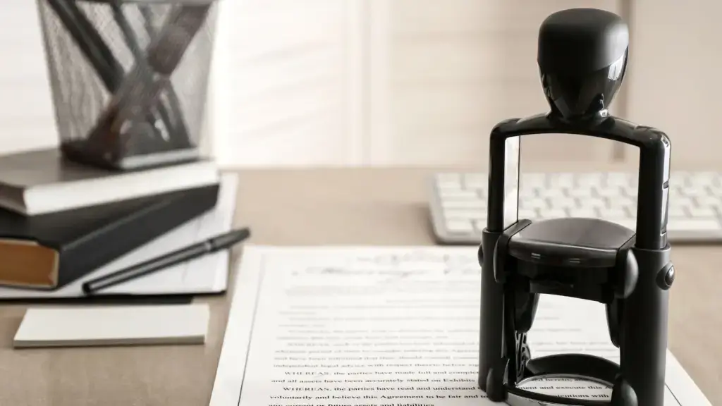 A stamp on top of a document.