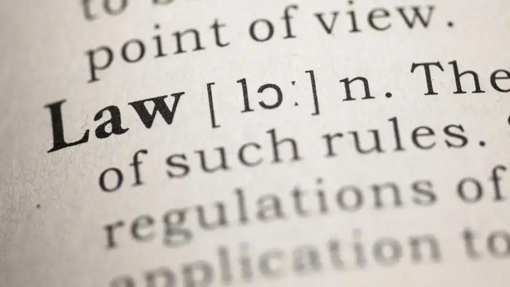 A closeup of the definition for the word 'Law'.