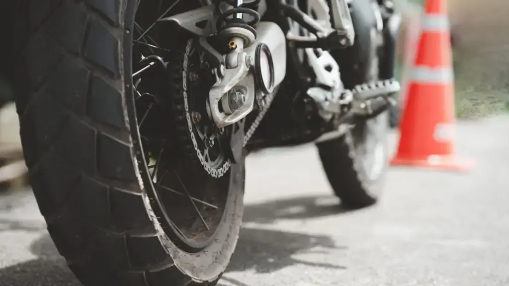 A close up of a motorcycle's wheels.