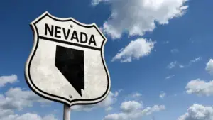 A Nevada sign on the road.