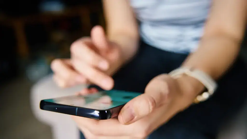 A woman on her phone. 