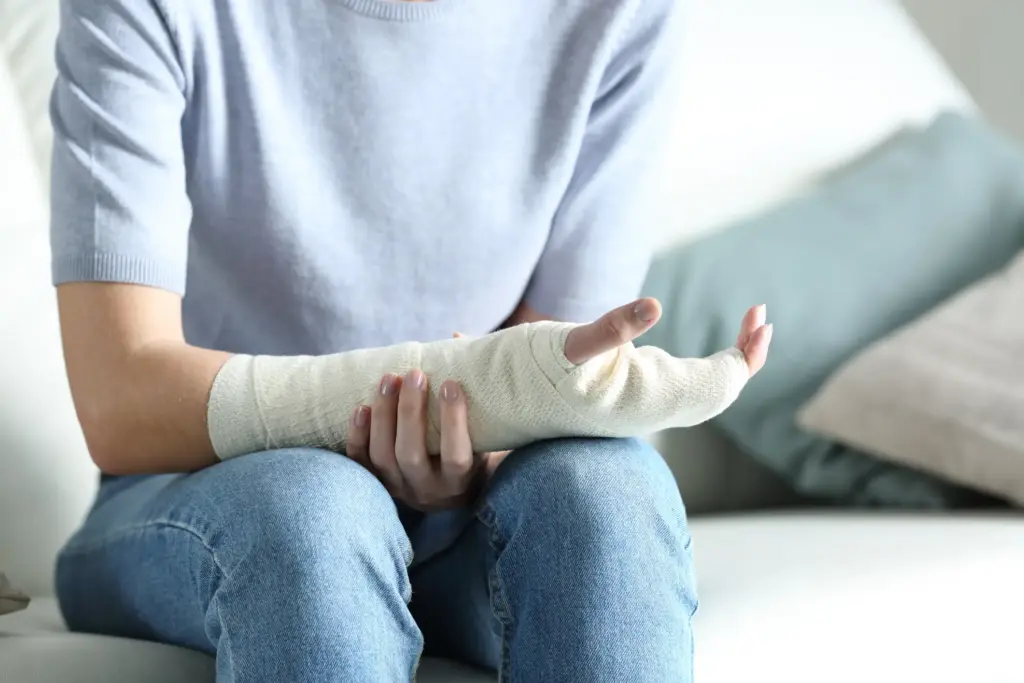 A person with a broken arm after experiencing an accident.