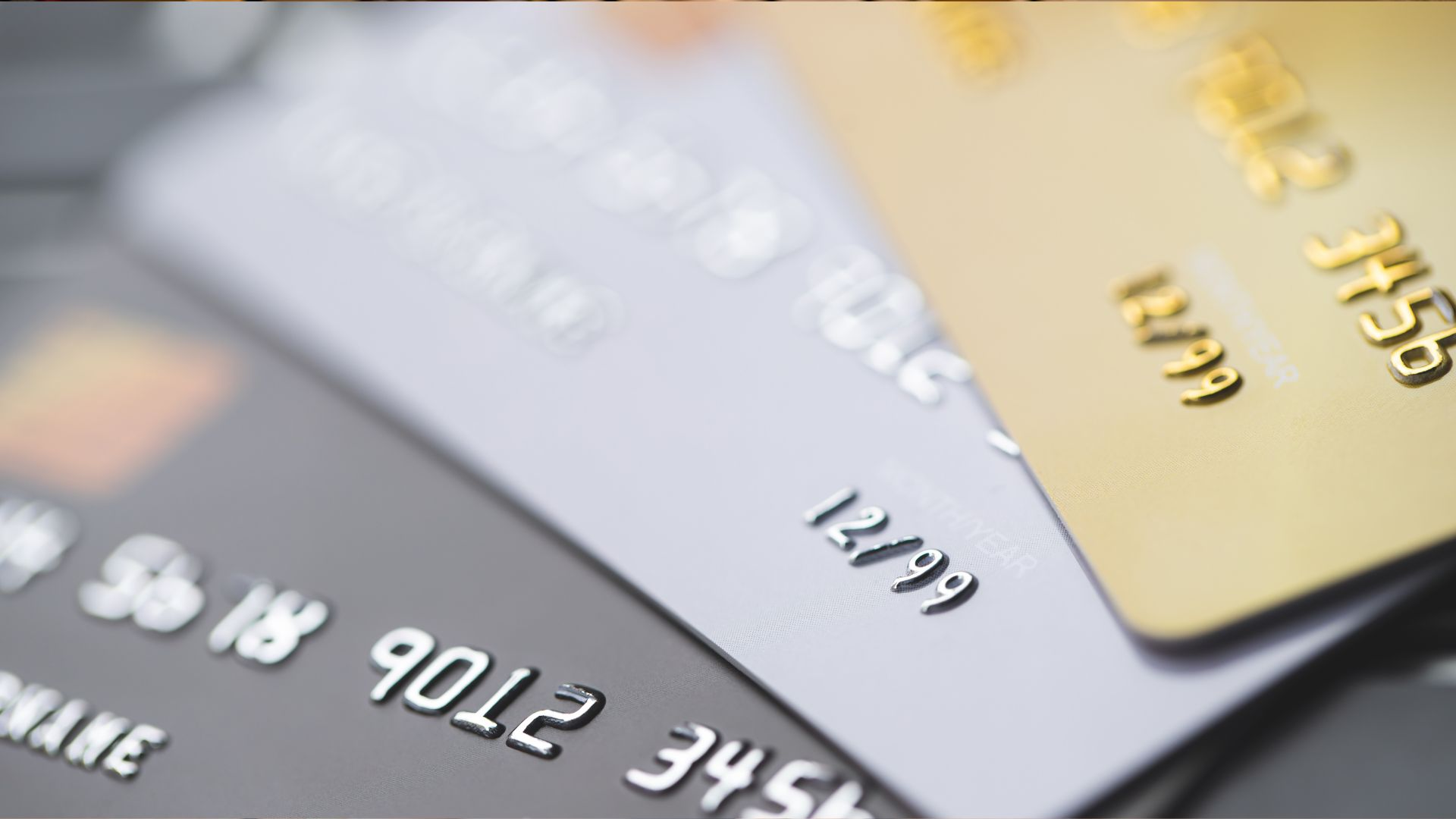 A closeup of three credit cards. 