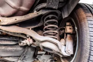 A defective car suspension. 