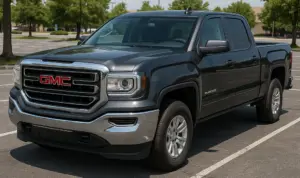 A black GMC Sierra 1500 parked in a parking lot. 