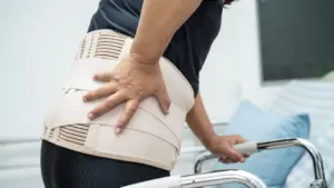 A woman with a sacral injury.