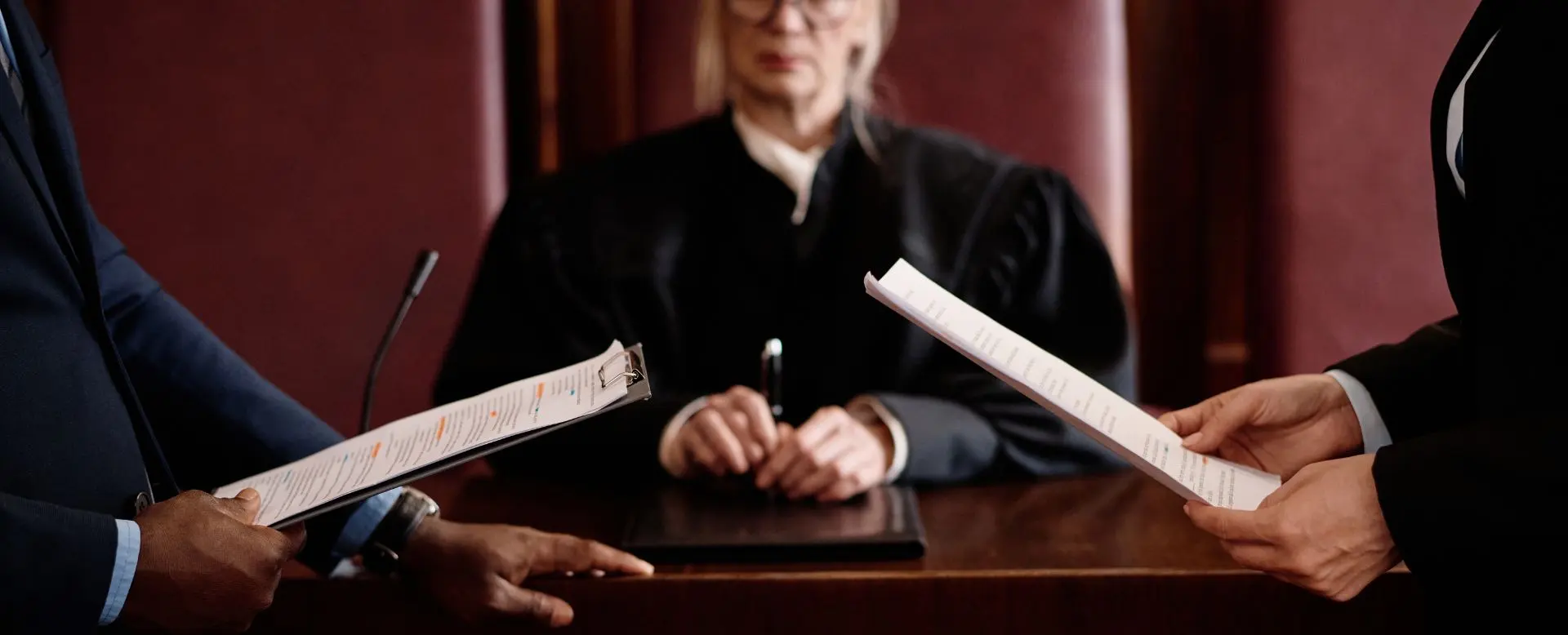 A judge hearing out two attorneys with their motions.