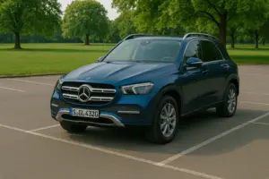 A blue Mercedes Benz GLC GLE SUV parked at a park.