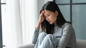 A woman contemplating about things.