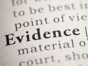 A close up of the definition of "evidence".