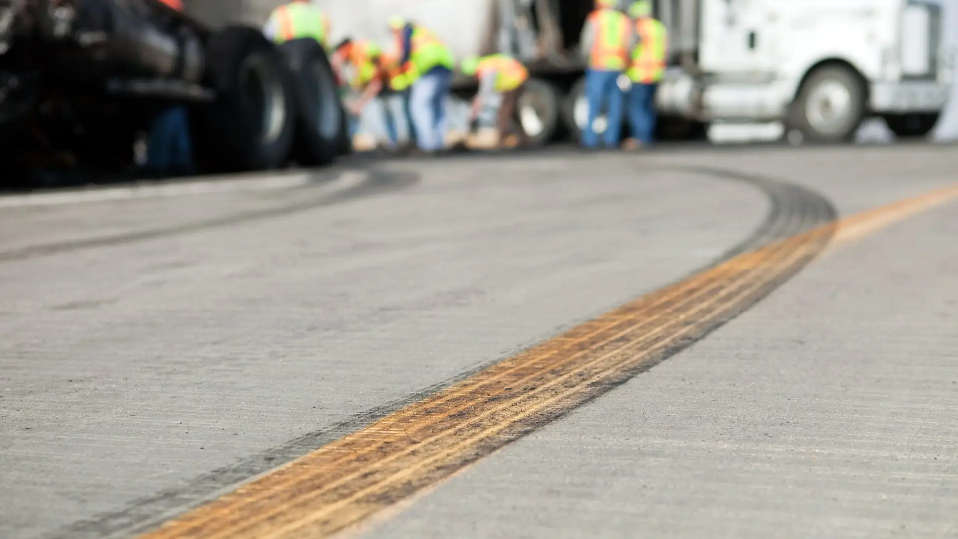 A skid mark on a highway indicating that a severe accident has occurred.