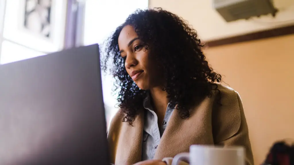 A woman on a computer.