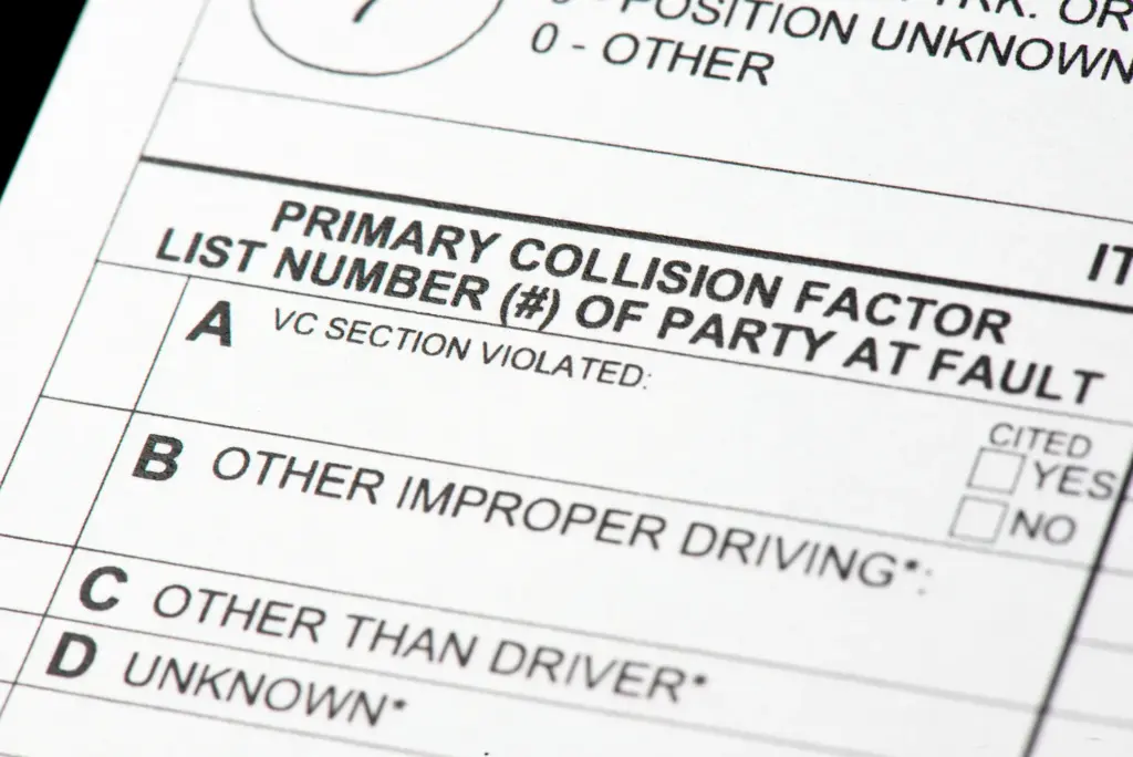 A close up of a police report for a car accident.
