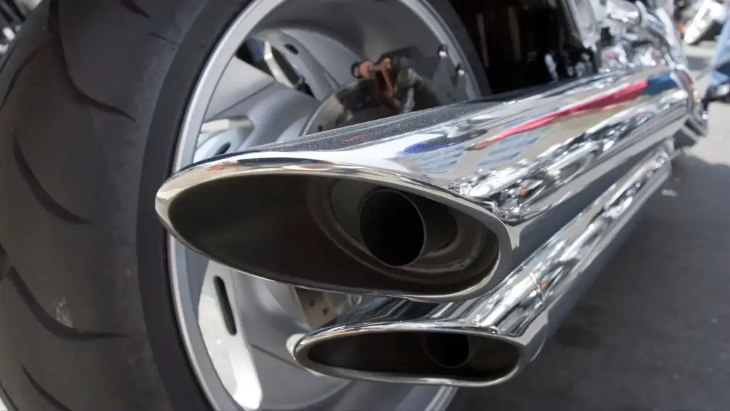 A close up of a motorcycle muffler. 
