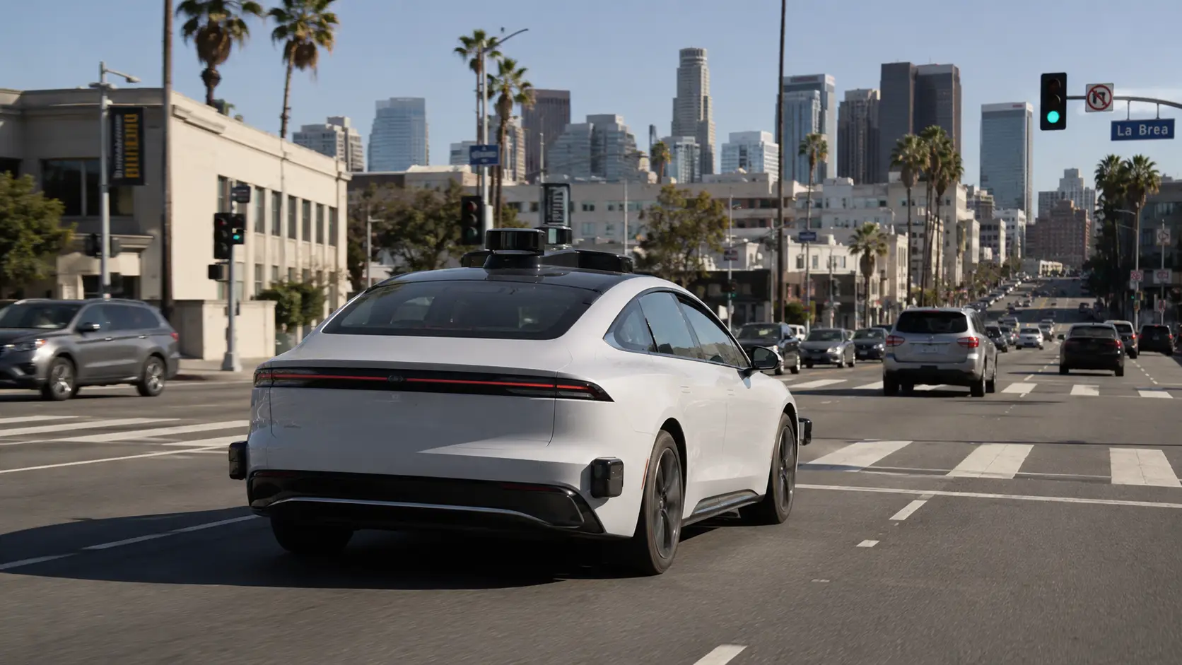 A self-driving car driving down the street.