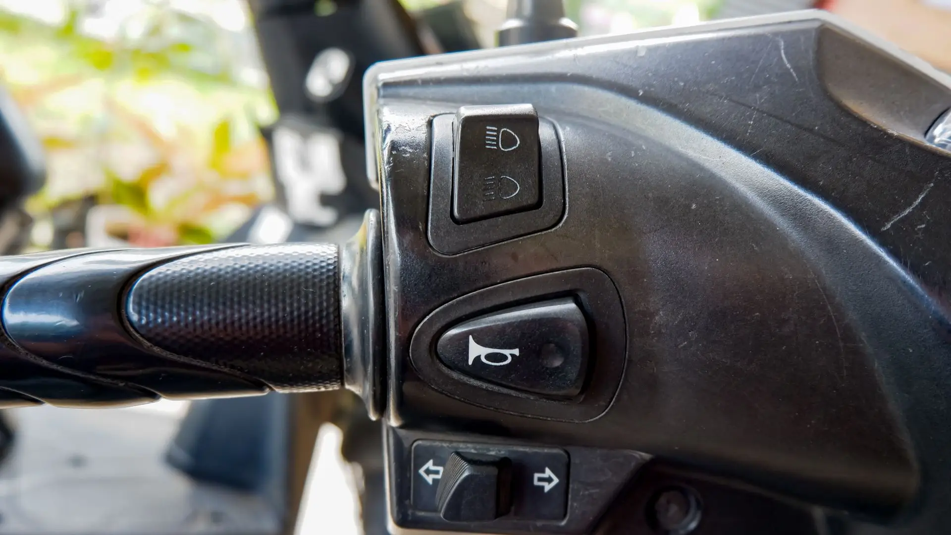 A motorcycle with an illegal horn modification.