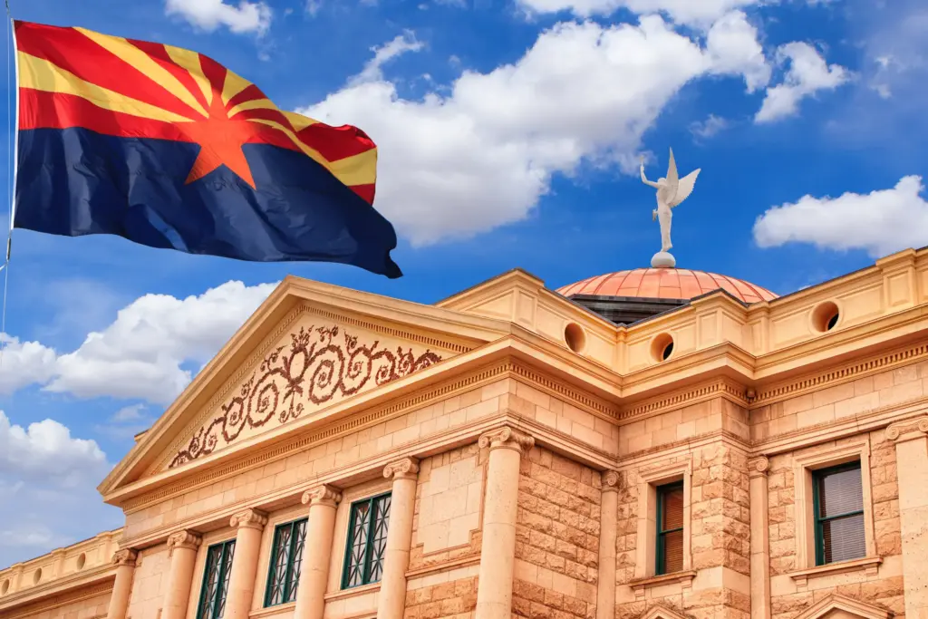 The Arizona state flag in front the municipal building.